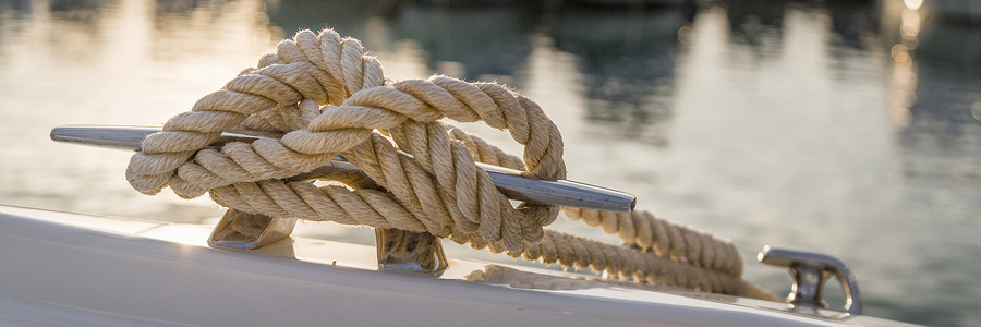 knot tied on side anchor of boat